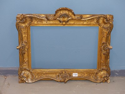 Lot 1187 - An 18th Century carved giltwood Rococo frame,...