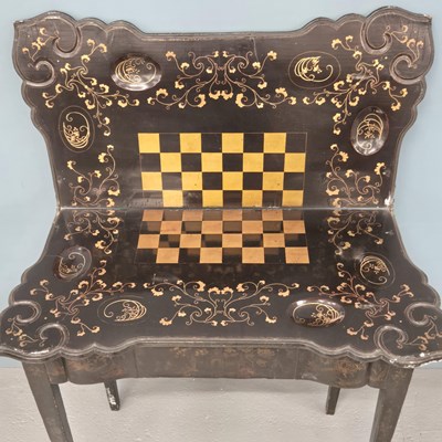Lot 547A - An antique Chinese export lacquer games table,...