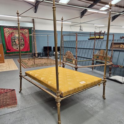 Lot 475 - A good quality Victorian brass four-poster bed....