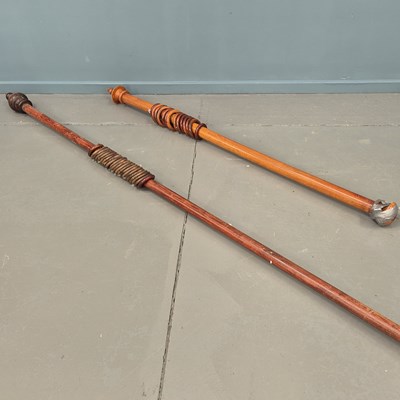 Lot 556 - Two 19th-century mahogany curtain rails, with...