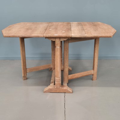Lot 1267 - A Heals arts and crafts oak drop leaf dining...