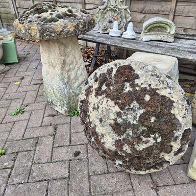 Lot 1105 - A group of Four antique staddle stone with caps.