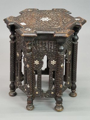 Lot 1299 - An Islamic mother of pearl inlaid and carved...