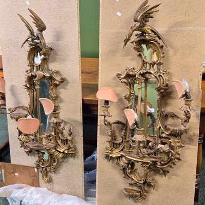Lot 1061 - An impressive pair of antique carved giltwood...