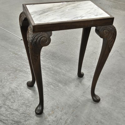 Lot 1147 - A small carved mahogany Georgian style marble...
