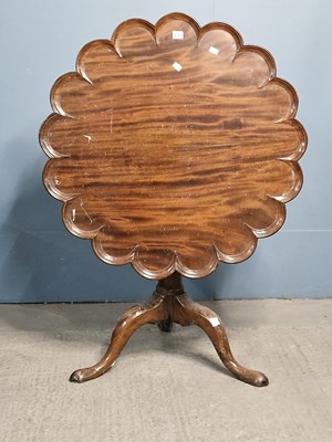 Lot 337 - A George III mahogany tripod table, the petal...