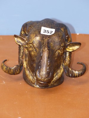 Lot 352 - A wall mounting parcel gilt bronze ram's head