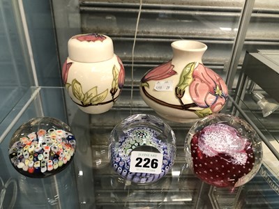 Lot 226 - A Moorcroft covered jar, a vase together with...
