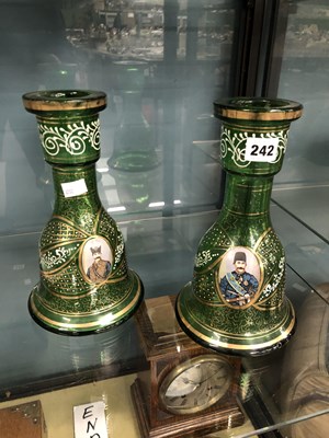 Lot 242 - A pair of green glass hookah pipe bases...