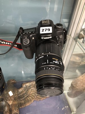 Lot 279 - A Canon EOS 70D camera, battery charger and...