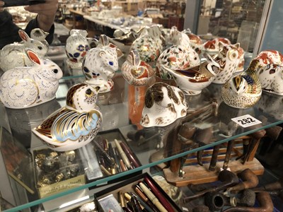 Lot 282 - A collection of 13 Crown Derby animal figure...