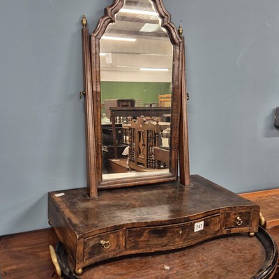 Lot 747 - An antique swing mirror and an oval drinks tray.