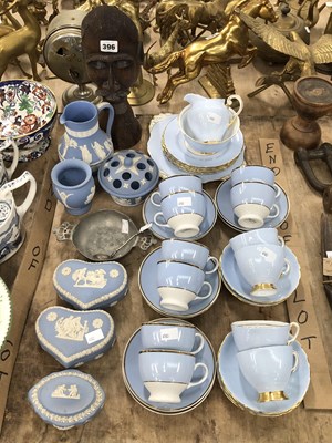 Lot 396 - A Tuscan sky blue tea set, Wedgwood blue...