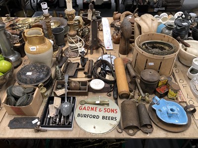 Lot 437 - Brass trivets, nutcrackers, graters, herb...