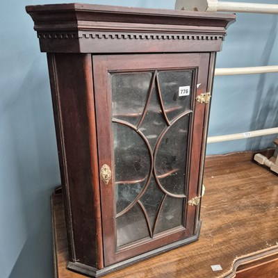 Lot 776 - A small antique corner cabinet