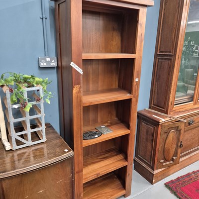 Lot 779 - A modern hardwood bookcase.