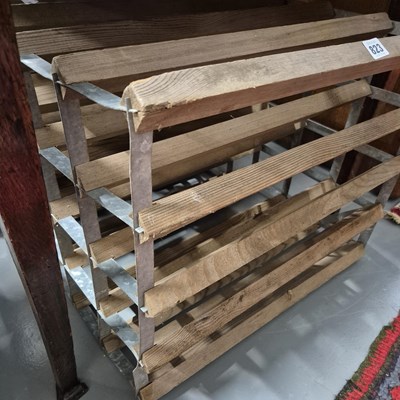Lot 823 - two wine racks.