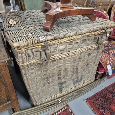 Lot 876 - A large laundry basket