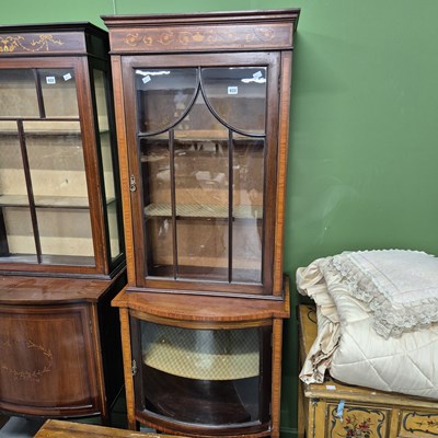 Lot 933 - An Edwardian inlaid mahogany display cabinet