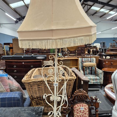 Lot 1212 - a wrought iron std. lamp
