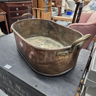 Lot 1219 - A large copper pan. H17 x W51 x D34cm