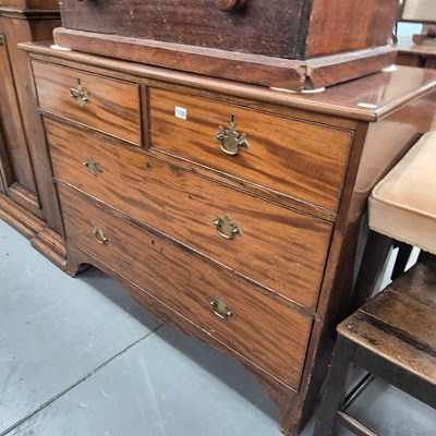 Lot 1120 - An early 19th-century mahogany chest of 4 drawers
