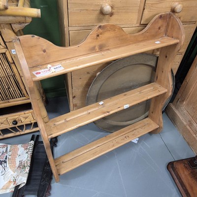 Lot 1137 - A pine wall shelf. H 90 W 83 D 15cms