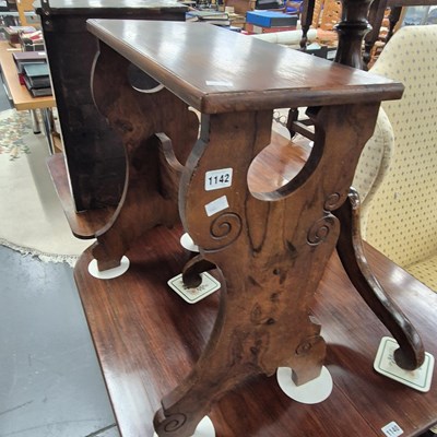 Lot 1142 - A vintage organ stool