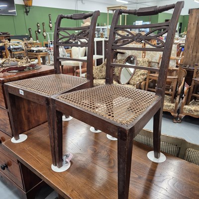 Lot 1152 - A pair of unusual georgian side chairs.