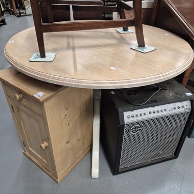 Lot 1168 - A limed oak breakfast table