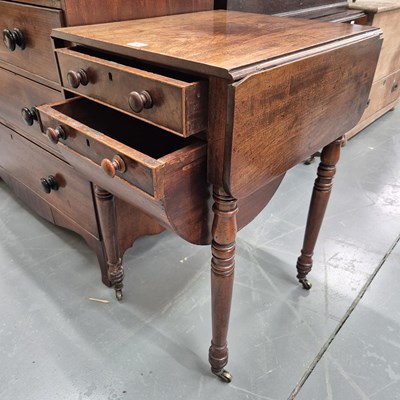 Lot 1025 - An early 19th-century mahogany work table. H...