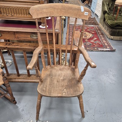 Lot 1036 - A Victorian kitchen armchair