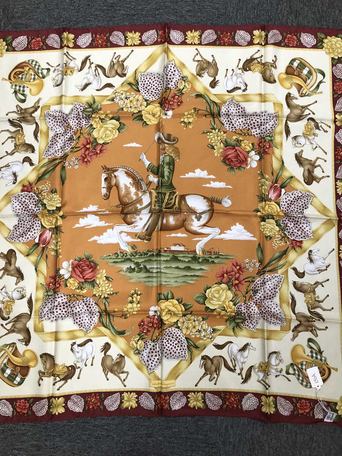 Lot 150 - A Salvatore Ferragamo silk horse print scarf