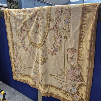 Lot 497a - A needlepoint rug of Aubusson design. 277 x...