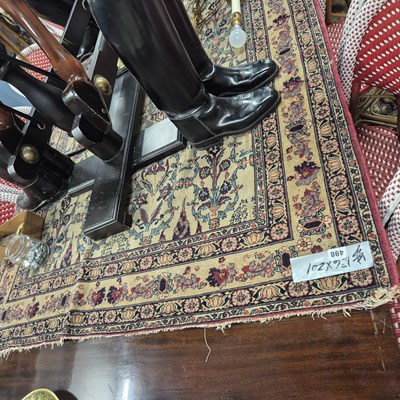 Lot 498 - An antique Persian Kirman rug of unusual...