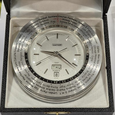 Lot 50 - A vintage Luxor Piston head form desk clock...