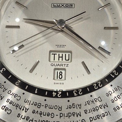 Lot 50 - A vintage Luxor Piston head form desk clock...