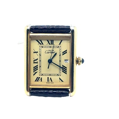 Lot 55 - Cartier Tank watch. Silver-gilt case with a...