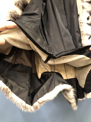Lot 143 - Clothing - Christian Dior, Fourrure. A striped...