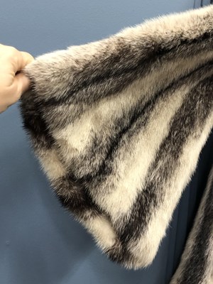 Lot 143 - Clothing - Christian Dior, Fourrure. A striped...