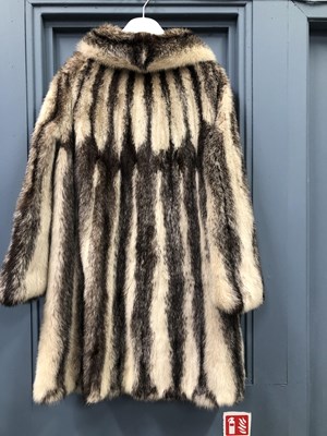 Lot 143 - Clothing - Christian Dior, Fourrure. A striped...