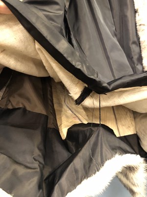 Lot 143 - Clothing - Christian Dior, Fourrure. A striped...