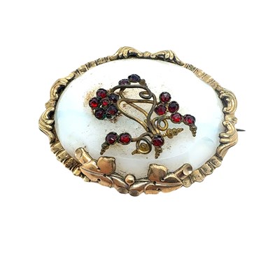 Lot 62 - Two late Victorian brooches, each with a gilt...