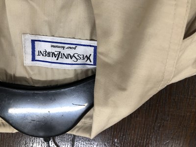 Lot 130 - A cream Yves Saint Laurent raincoat, size 36/48