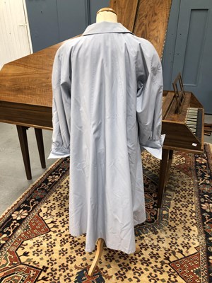 Lot 133 - A light blue rain mac by Harrods size 36