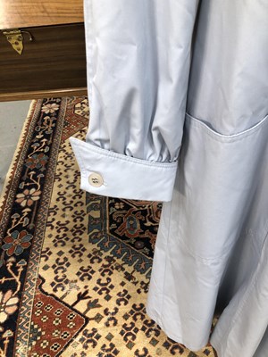 Lot 133 - A light blue rain mac by Harrods size 36