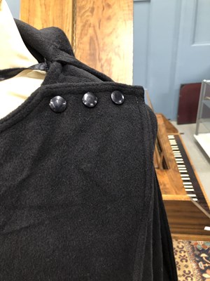Lot 134 - A black cape, one size