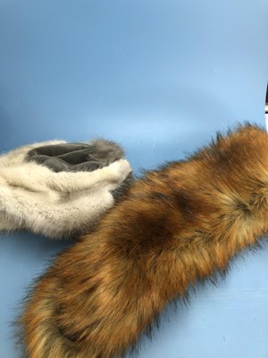 Lot 136 - A collection of fur hats, stoles, scarves, etc.