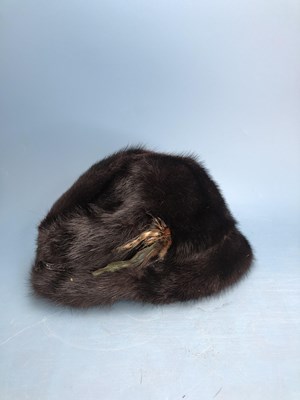 Lot 136 - A collection of fur hats, stoles, scarves, etc.