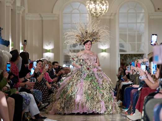 Lot 128 - Bloom reborn. This captivating dress is...